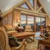 Faraway Jackson Hole in Teton Village living room with mountain views through large windows and balcony