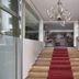 Park Suites Hotel Luxury Boutique Hotel in Casablanca stairway with red carpet runner and modern chandelier