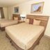 Clatskanie River Inn room in Clatskanie with two double beds and window view