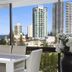 Surfers Plaza Resort in Surfers Paradise with balcony dining area and city skyline views