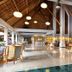 Grand Palladium White Sand Resort & Spa in Akumal lobby with high thatched ceiling and polished floors