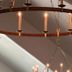 Maxwelton Braes Lodge, Baileys Harbor: rustic ceiling chandelier with lit candles in a warmly lit room