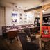 Hotel du Vin Bristol bar lounge in Bristol with leather seating, exposed beams and a fireplace