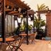Oasi Azzurra in Villafranca Tirrena with shaded outdoor terrace and seating beside pool