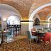 Pousada de Lisboa in Lisbon dining room with brick vaulted ceilings and set tables