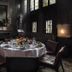 Hotel Les Bains Paris dining room in Paris with a round set table, dark walls, and stained-glass windows