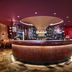 Cairn Hotel Newcastle Jesmond bar with curved counter and colorful lounge in Newcastle upon Tyne