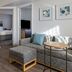 TownePlace Suites by Marriott Ontario Airport suite with living area, dining table and bedroom view in Rancho Cucamonga