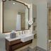 Disney's Port Orleans Resort - French Quarter bathroom with pedestal sink and marble shower in Lake Buena Vista