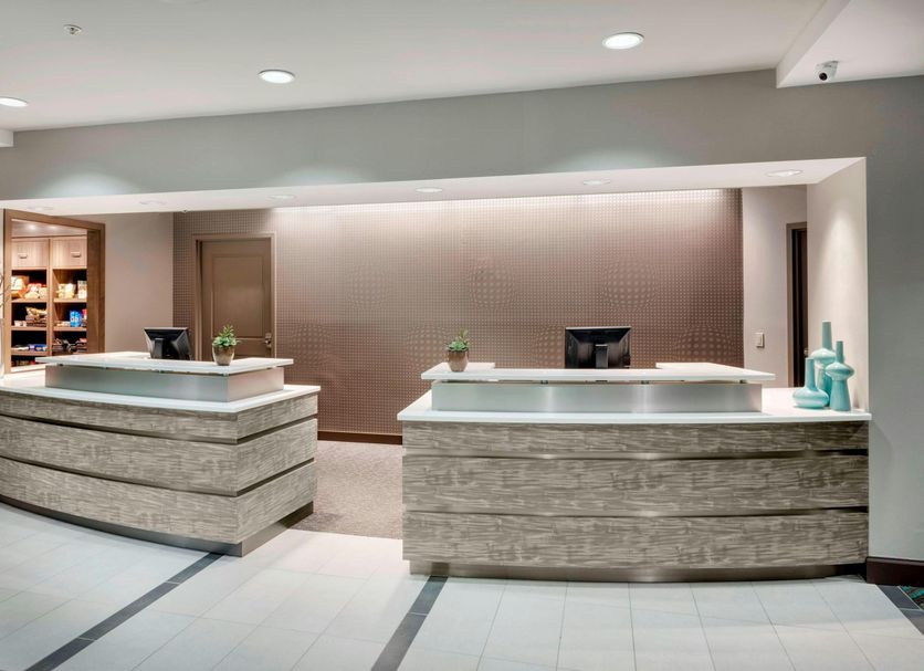 Residence Inn by Marriott Portsmouth lobby reception desk with modern wood counters