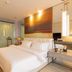 Jinjiang Metropolo Hotel Shenyang Shengjing Hospital Sanhao Street guest room with king bed and modern lighting in Shenyang