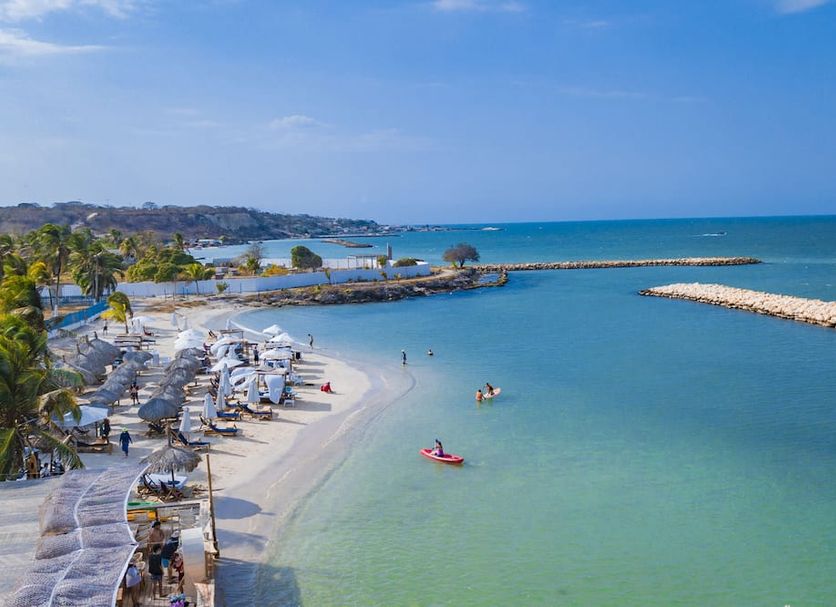 Palmarito Beach Hotel in Tierra Bomba with a sandy beach, calm turquoise sea and breakwater view