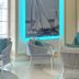 Hotel Miramare & Spa in Sestri Levante lounge with sailboat artwork and wicker seating