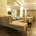 Hotel Centre Point in Nagpur lounge with chaise seating, coffee table and warm recessed lighting