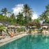Les Villas Ottalia Yoga & Diving, Gili Meno pool with palm trees and lounge chairs in Pemenang