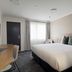 The Phoenix Artesian Spa Resort and Accommodation room in Moree with king bed and desk