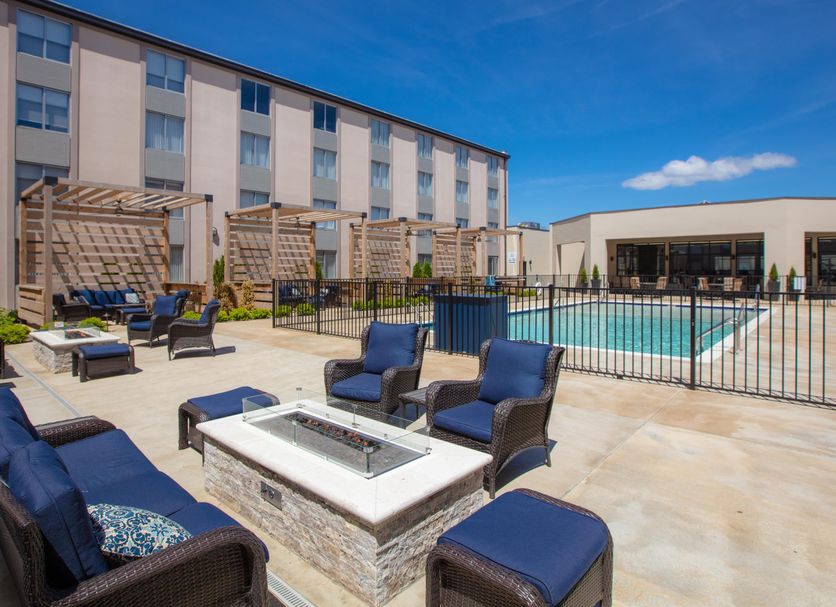 Holiday Inn St Louis Sw - Route 66 By IHG in St. Louis: outdoor pool and fire pit seating area