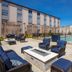 Holiday Inn St Louis Sw - Route 66 By IHG in St. Louis: outdoor pool and fire pit seating area