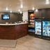 My Place Hotel-Idaho Falls, Id front desk with snack and drink coolers in Idaho Falls