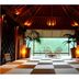 Hakone Ginyu in Hakone lounge with checkered floor, chairs, and large window to green view