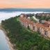Westgate Branson Lakes Resort in Hollister with lakeside hillside buildings and water views