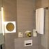 Zollamt Design Hotel Kaiserslautern bathroom with wall-mounted toilet, sink and towel rack