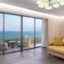 Ela Excellence Resort Belek room with ocean-view balcony and seating area in Belek