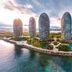 Vienna Hotel Sanya Bay No.1 in Sanya with tower-style buildings on a waterfront peninsula and ocean views