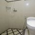 RedDoorz @ Seturan Raya 2 bathroom in Depok with wall-mounted shower and toilet