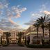 The Westin Anaheim Resort in Anaheim with palm-lined courtyard and sunset sky