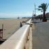 Hotelf1 Narbonne Sud in Narbonne near a sandy beach promenade with palm trees and sea view