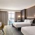 Renaissance Phoenix Glendale Hotel & Conference Center guest room with two beds and city view