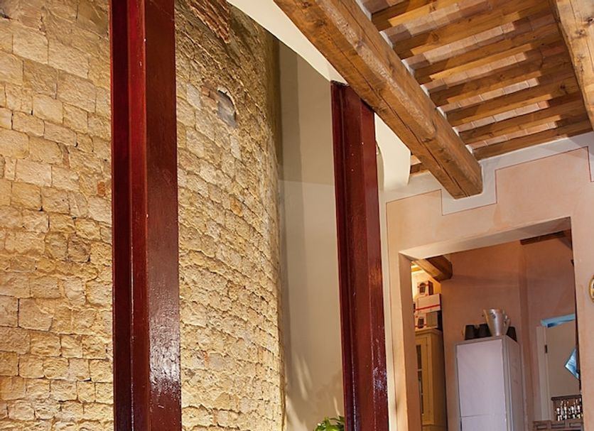 Borgo Sant'ippolito Country Hotel in Lastra a Signa restaurant with rustic stone walls and table settings