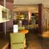 Premier Inn Ashford - Eureka Leisure Park bar and lounge with seating and staircase in Ashford