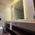Sunday Hotel Al Olaya Formerly Novotel Suites Riyadh Centre bathroom with walk-in shower and vanity