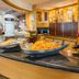 City Lodge Hotel Grandwest in Cape Town buffet counter with pasta tray and wine rack