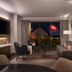 The Westin Anaheim Resort in Anaheim suite with balcony view of illuminated theme park skyline