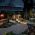 Van Der Valk Hotel Apeldoorn - De Cantharel garden courtyard with loungers and path in Apeldoorn