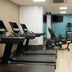 Sketchley Grange Hotel & Spa Leicester gym with treadmills, exercise bike and weights area