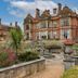 The Welcombe Hotel, Stratford-upon-Avon: ornate red-brick manor with landscaped gardens and fountain