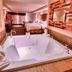 The Woodlands Inn in Wilkes-Barre suite with whirlpool tub and king bed