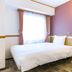 Toyoko Inn Hokkaido Tomakomai Ekimae guest room with single bed and window in Tomakomai