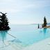 Infinity pool at Nido, Mar-Bella Collection an SLH hotel in Agios Ioannis Peristeron overlooking the sea