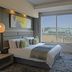 The Capital Menlyn Maine Pretoria guest room with king bed and large window view