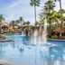 Sheraton Vistana Villages Resort Villas, I-Drive/Orlando pool with fountain, palm trees and resort buildings