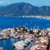 Tui Magic Life Sarigerme Hotel in Ortaca with marina yachts and blue bay views