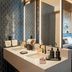 Canopy by Hilton Cancun La Isla guest room with dual vanity and a king bed in Cancún