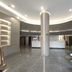Dream 8 Business Hotel lobby in Taizhou with modern circular ceiling, front desk, and seating area