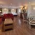 Sanibel Island Beach Resort in Sanibel suite with red sofa, dining table and two beds