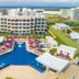 Planet Hollywood Cancun, An Autograph Collection Resort in Cancún with a large pool, loungers, and ocean view